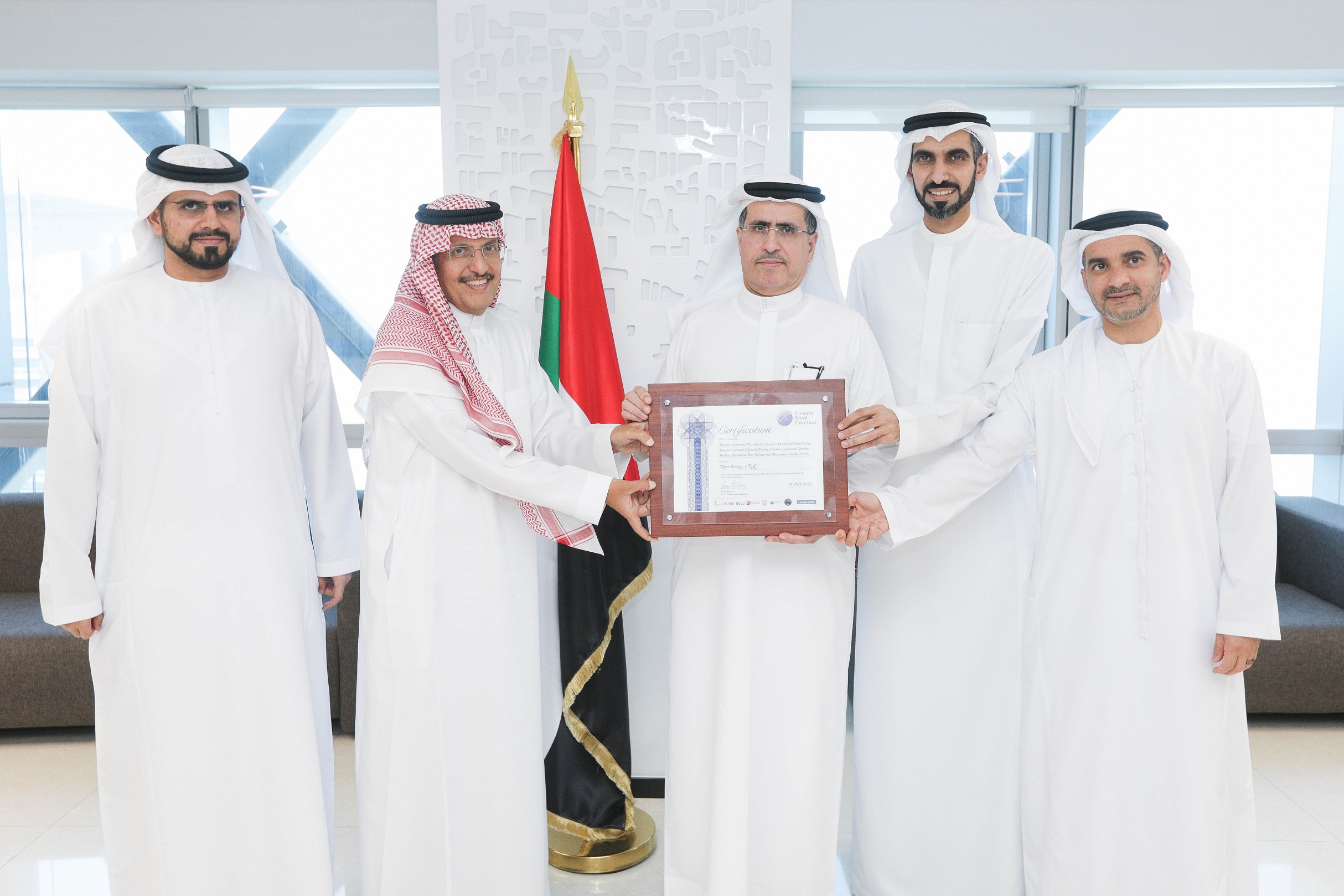 Officials from ACWA Power and DEWA