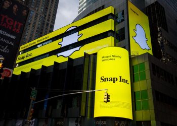Snap Inc. signage is displayed on screens outside of the Morgan Stanley building in New York, U.S., on Thursday, Feb. 16, 2017. Snap Inc. is seeking to raise as much as $3.2 billion in its initial public offering in what could be the third-biggest technology listing of the past decade. Photographer: Michael Nagle/Bloomberg via Getty Images