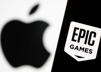 Smartphone with Epic Games logo is seen in front of Apple logo in this illustration taken, May 2, 2021. REUTERS/Dado Ruvic/Illustration