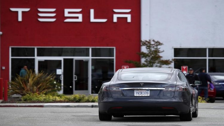 BURLINGAME, CALIFORNIA - MAY 20: A Tesla Model S drives into the parking lot of a Tesla showroom and service center on May 20, 2019 in Burlingame, California. Stock for electric car maker Tesla fell to a 2-1/2 year low after Wall Street analysts questioned the company's growth prospects. (Photo by Justin Sullivan/Getty Images)