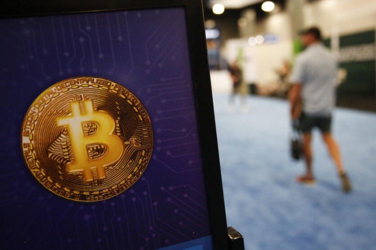 MIAMI, FLORIDA - APRIL 8: A bitcoin logo is seen during the Bitcoin 2022 Conference at Miami Beach Convention Center on April 8, 2022 in Miami, Florida. The worlds largest bitcoin conference runs from April 6-9, expecting over 30,000 people in attendance and over 7 million live stream viewers worldwide.  Marco Bello/Getty Images/AFP (Photo by Marco Bello / GETTY IMAGES NORTH AMERICA / Getty Images via AFP)