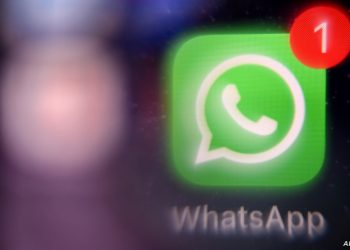 A picture taken on March 23, 2022 in Moscow shows the US instant messaging software Whatsapp logo on a smartphone screen. (Photo by AFP)