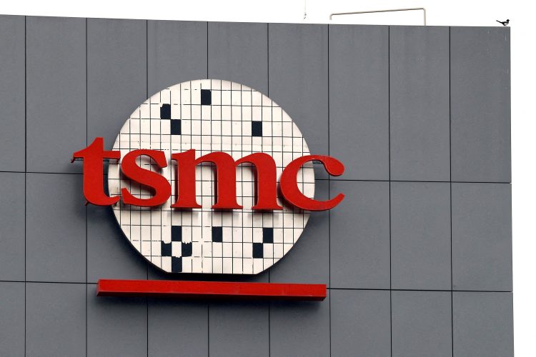 FILE PHOTO: A logo of Taiwanese chip giant TSMC can be seen in Tainan, Taiwan
