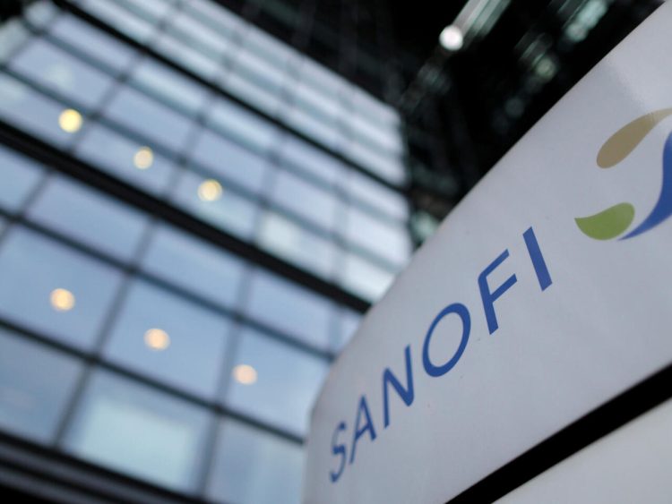 FILE PHOTO: A Sanofi sign outside the French drugmaker's Paris headquarters